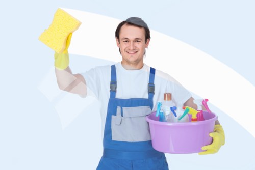 Team applying health and safety standards during cleaning