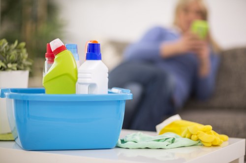 Cleaner checking a service checklist after a complaint